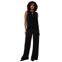 Load image into Gallery viewer, Image of full view of model, wearing the Esqualo Bow Brooch Blouse.
