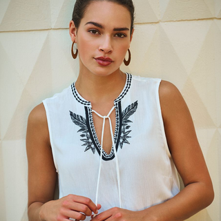 Esqualo Sleeveless Top, adorned with exquisite embroidered details around the neckline