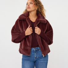 Load image into Gallery viewer, Poncho on Model with jeans 
