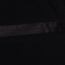 Load image into Gallery viewer, Close-up of black fabric with a subtle pattern
