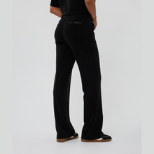 Load image into Gallery viewer, Person wearing black pants on a plain background
