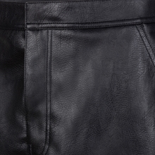 Load image into Gallery viewer, Close-up of black leather texture
