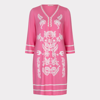 Pink dress with white embroidery on a light gray background
