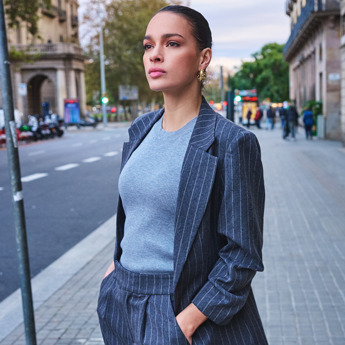 Girl in street with blazer on 