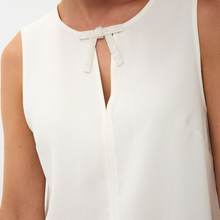 Load image into Gallery viewer, Close up  Image of model, wearing the Esqualo Bow Brooch Blouse
