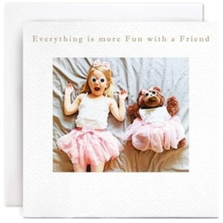 Greeting card with a girl and teddy bear in ballet costumes and text 'Everything is more fun with a friend'.