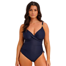 Load image into Gallery viewer, Woman wearing a navy blue swimsuit on a white background
