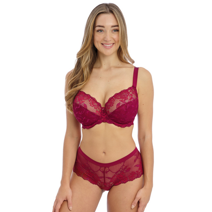 A model smiling wearing the Fantasie Aubree Bra and matching short.