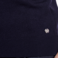 Load image into Gallery viewer, Close-up of a dark navy knit garment with a ribbed hem and a small silver-tone button detail near the lower right side.
