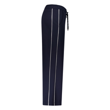 Load image into Gallery viewer, Navy blue pants with white stripes on a white background
