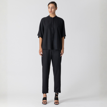 Load image into Gallery viewer, Person wearing a black outfit on a white background
