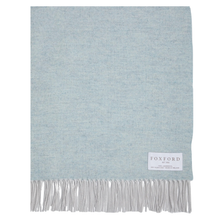 Load image into Gallery viewer, Light blue throw blanket with white fringe and 'Foxford' label on a white background
