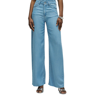 Light blue jeans worn by a person on a white background