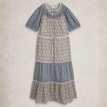Load image into Gallery viewer, Patterned dress on a light gray background
