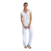 Load image into Gallery viewer, Woman wearing a white outfit on a white background
