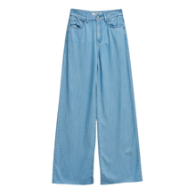 Load image into Gallery viewer, Light blue jeans on a white background

