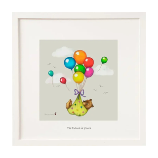 Framed artwork of a baby in a crib with colorful balloons and text 'The Future is Yours'.