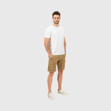 Load image into Gallery viewer, Model with T-shirt and shorts, hands in pockets and trainers 

