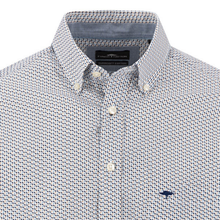 Load image into Gallery viewer, A close-up of a men's button-down shirt by The Penny Tree, featuring a white base with a dense navy blue micro-pattern. The shirt includes a classic collar, white buttons, and a small navy blue embroidered logo on the left chest.
