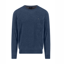 Load image into Gallery viewer, Blue sweater with a small logo on a white background
