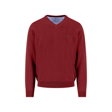 Load image into Gallery viewer, Red sweater with a small logo on a white background
