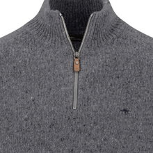 Load image into Gallery viewer, Close-up of a dark gray ribbed knit quarter-zip sweater with a silver zipper and a small dark embroidered logo on the chest.
