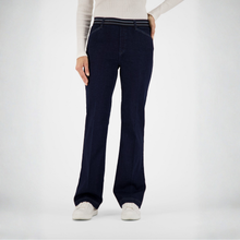 Load image into Gallery viewer, Dark denim pants on a light gray background
