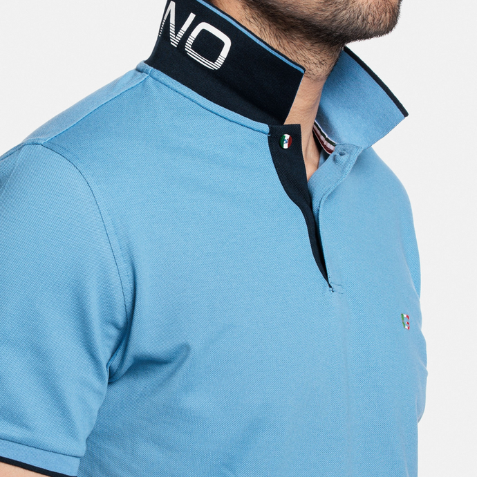 Collar Detail of the Polo Shirt Up and on Man