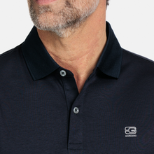 Load image into Gallery viewer, Up close image of polo shirt and button detail 
