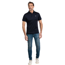 Load image into Gallery viewer, Model with jeans and polo shirt with trainers 
