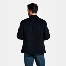 Load image into Gallery viewer, Man wearing a navy jacket and blue jeans on a white background
