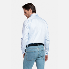 Load image into Gallery viewer, Man wearing a light blue shirt and jeans on a white background

