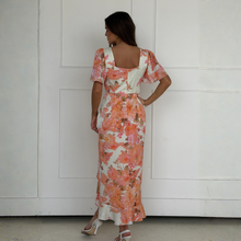 Load image into Gallery viewer, Woman in Floral Dress
