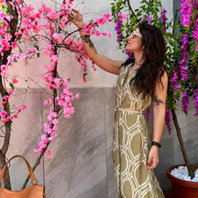 Load image into Gallery viewer, Side view of woman in dress in a garden 
