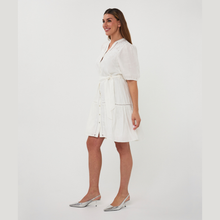 Load image into Gallery viewer, Woman wearing a white dress on a plain background
