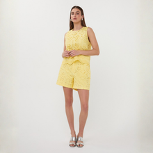 Load image into Gallery viewer, Woman wearing a yellow lace dress on a white background
