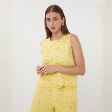 Load image into Gallery viewer, Woman wearing a yellow lace dress against a white background
