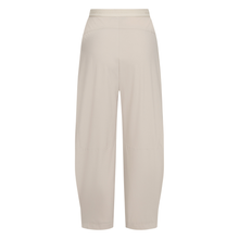 Load image into Gallery viewer, Back of jersey trousers in chalk color on a white background.
