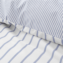 Load image into Gallery viewer, Close-up of blue and white striped fabric with a pillow.
