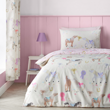Load image into Gallery viewer, Duvet set on bed with Horse Motive in bedroom setting 
