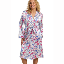 Load image into Gallery viewer, Woman wearing a floral patterned robe on a white background
