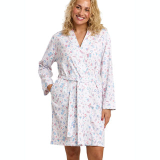 Woman wearing a patterned robe on a white background