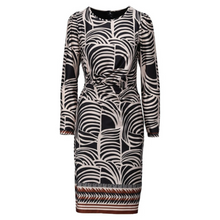 Load image into Gallery viewer, Patterned dress with long sleeves on a white background
