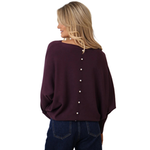 Load image into Gallery viewer, Woman wearing a dark purple blouse with button details on a white background
