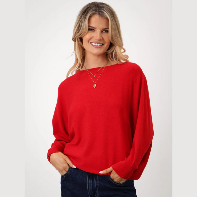 Lady in Red sweater with Jeans on white background 