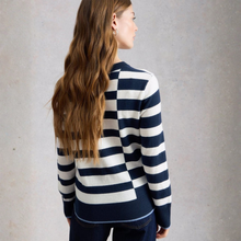 Load image into Gallery viewer, Woman wearing a navy and white striped sweater against a gray background
