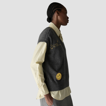 Load image into Gallery viewer, Side view of vest top on model 

