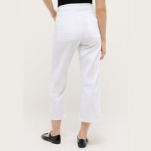 Load image into Gallery viewer, White pants worn by a person on a white background
