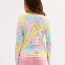 Load image into Gallery viewer, Woman wearing a colorful long-sleeve shirt with a floral pattern on a white background
