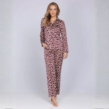 Load image into Gallery viewer, Lady in leopard print pj set on grey background 
